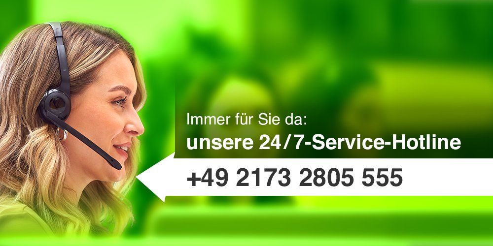 lächelnder Mann mit Headset, 24/7-Service-Hotline-Rufnummer: +49 2173 2805 555