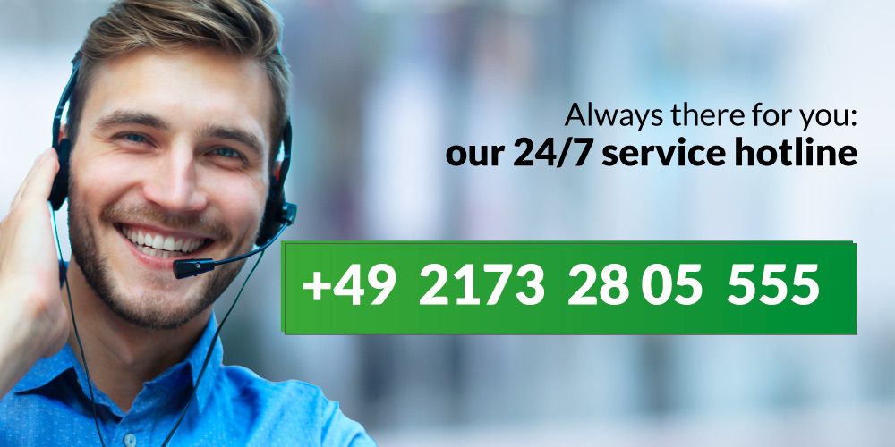 smiling man with Headset, 24/7 Hotline: +49 2173 2805 555